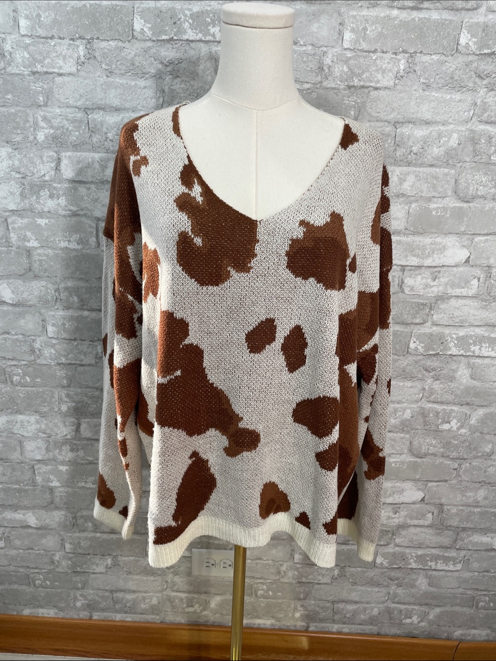 Altar'd State Brown and Cream V-Neck Cow Pattern Sweater